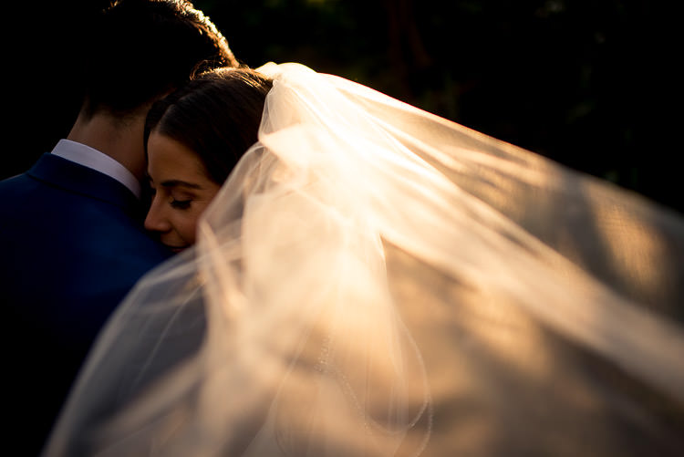 prime lens photography bride with backlit veil