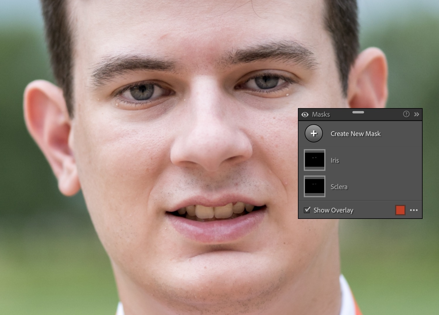 Lightroom AI: Close-up portrait of a young man.