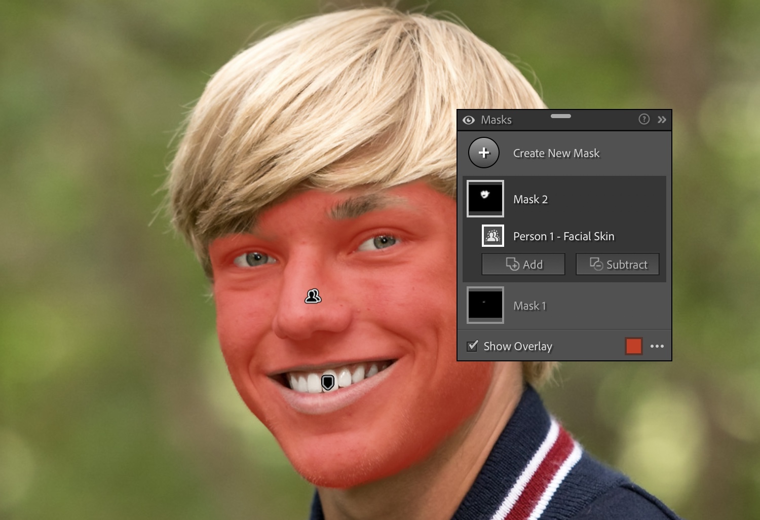 Lightroom AI: Screenshot showing an AI-generated Facial Skin mask. The skin is masked, but not the other facial features like eyes, teeth, and eyebrows.
