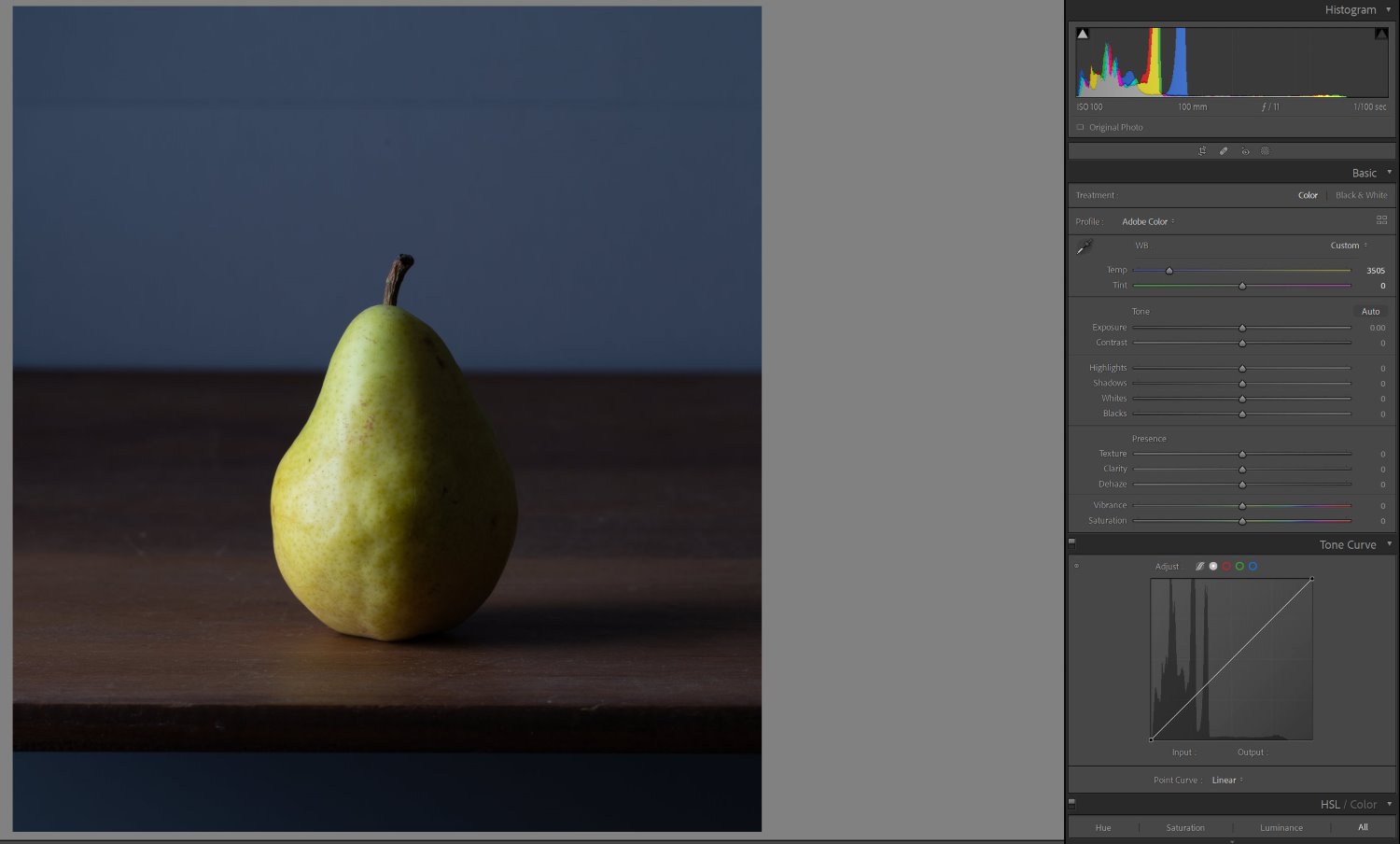 A white-balanced photo of a pear in Lightroom