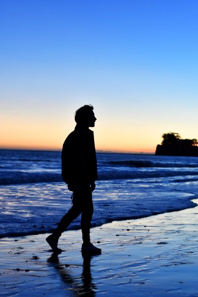 silhouette of a man on a beach