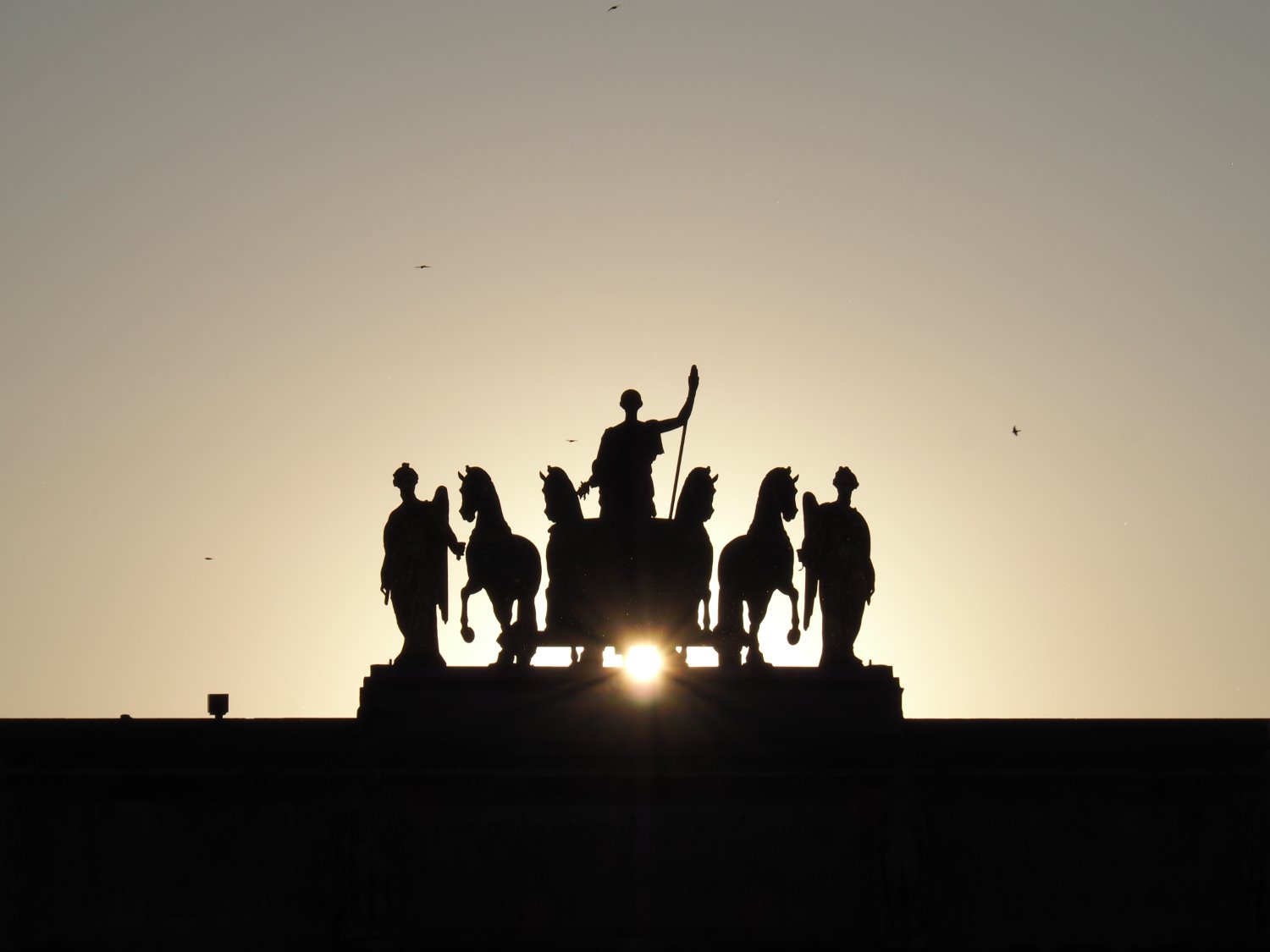 silhouette photography statue