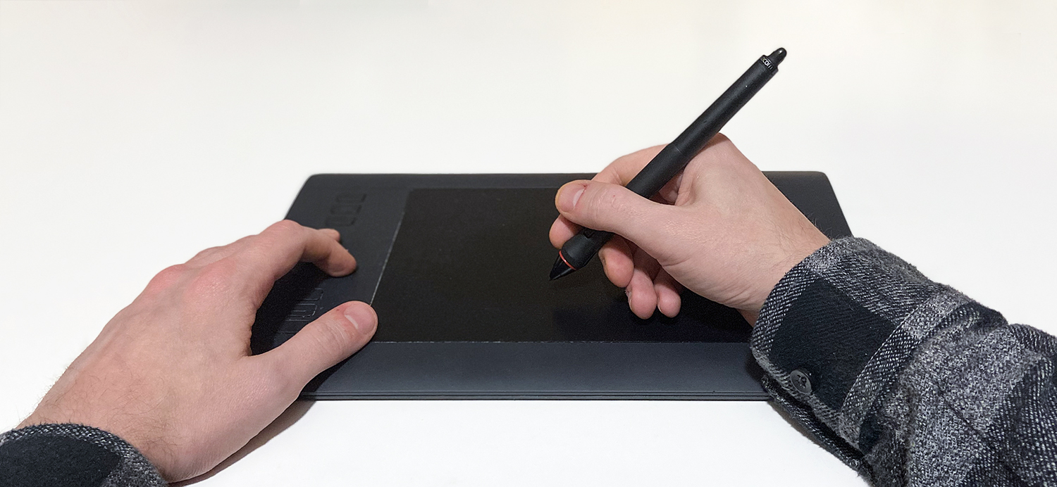Using a graphics tablet for retouching photos. 